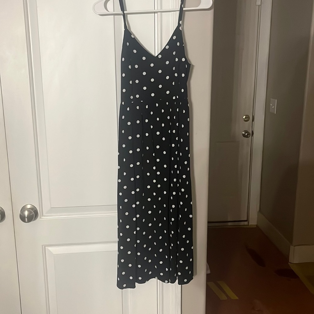 Black and white poka dot dress, mid length